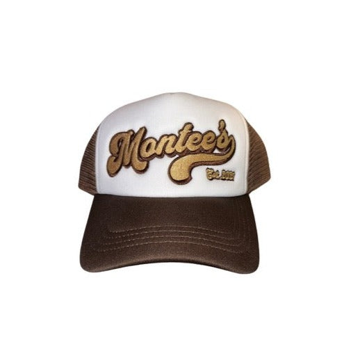 Montee’s Trucker Hat – Streetwear-inspired hat with mesh back and bold front logo. Perfect for adding an edge to any casual look. Front